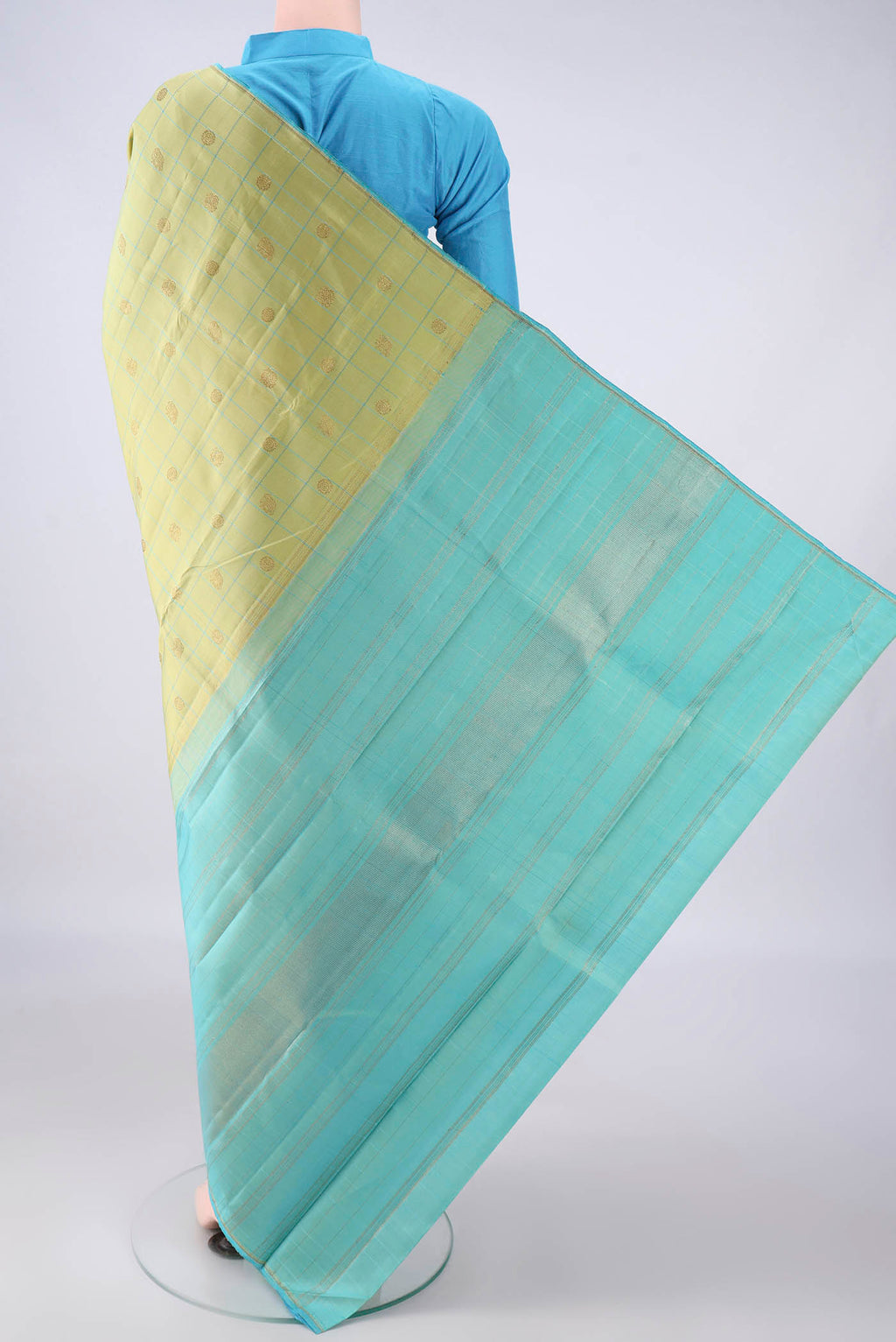 Flat view of Pure Silk Light Green Kanjivaram Saree with Checked design on the body and Without Border. 