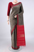 Pure Silk Pure Zari Davys Grey Dual Tone Kanjivaram Saree with Plain Body and Zari Border.  displayed on a mannequin