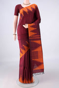 Pure Silk Maroon Kanjivaram Saree with Plain Body and Temple Border.  displayed on a mannequin