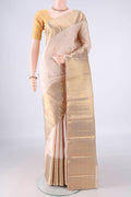 Pure Silk Beige Dual Tone Kanchipuram Saree with Zari Butta on the body and Zari Border.  displayed on a mannequin
