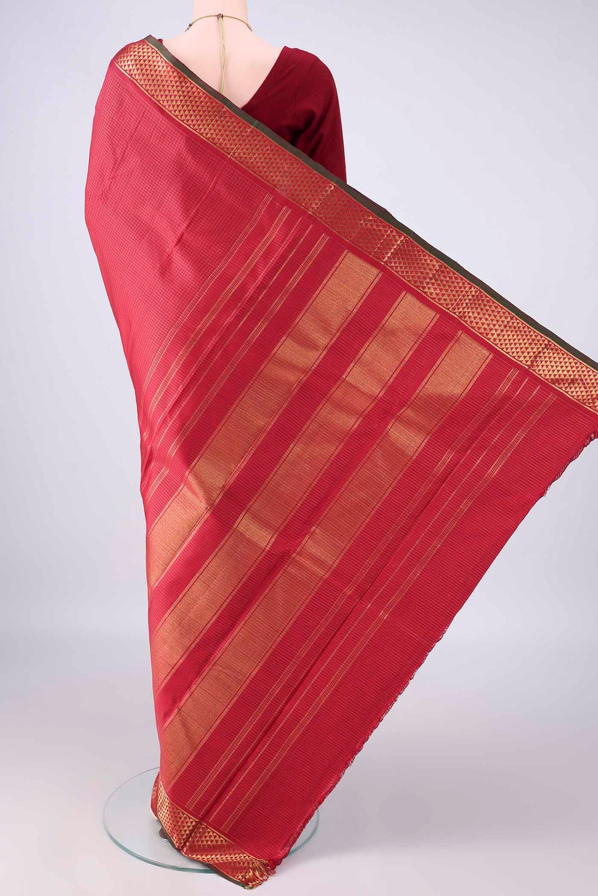 Flat view of Pure Silk Red Kanjivaram Saree with Checked design on the body and Zari Border. 
