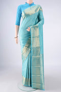 Pure Silk Sky Blue Kanjivaram Saree with Zari Brocade on the body and Zari Border.  displayed on a mannequin
