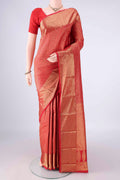 Pure Silk Red Kanjivaram Saree with Zari Brocade on the body and Zari Border.  displayed on a mannequin