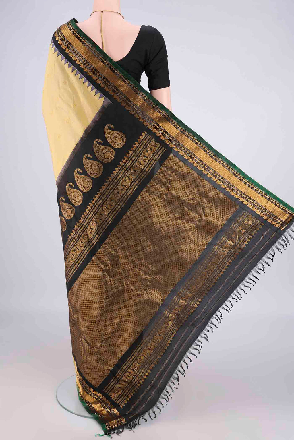 Flat view of Pure Silk Sandal Gadwal Saree with Zari Butta on the body and Zari Border. 