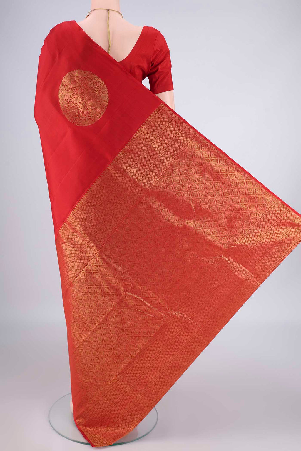 Flat view of Pure Silk Red Kanchipuram Saree with Zari Butta on the body and Without Border. 