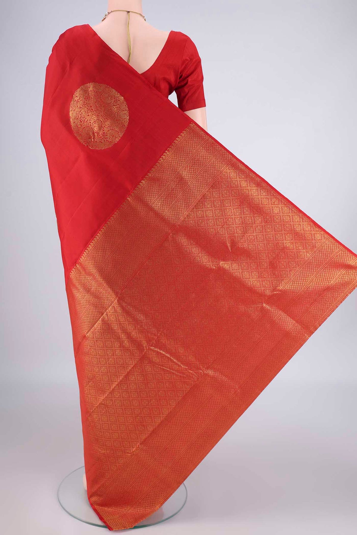 Flat view of Pure Silk Red Kanchipuram Saree with Zari Butta on the body and Without Border. 