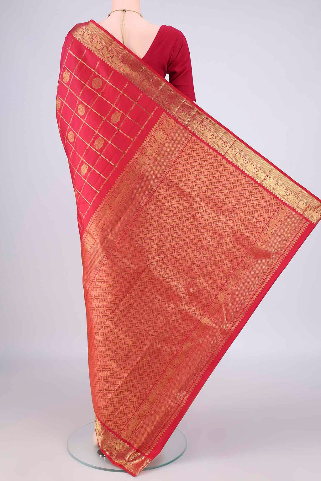 Flat view of Pure Silk Red Kanjivaram Saree with Checked design on the body and Zari Border. 