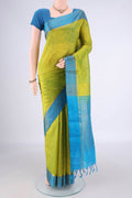 Acid Green Coimbatore Cotton Saree with Jacquard design on the body and Zari Border.  displayed on a mannequin