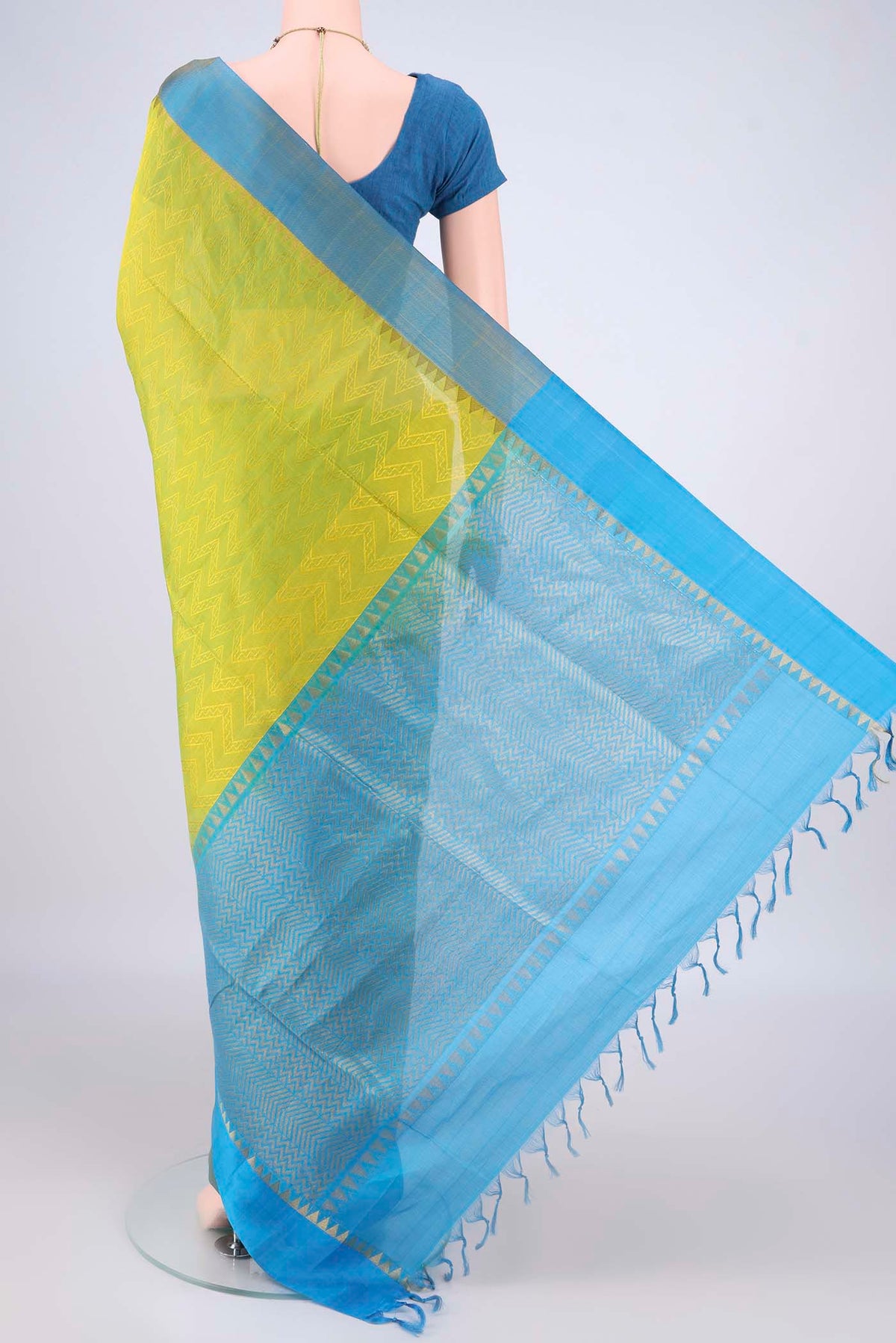 Flat view of Acid Green Coimbatore Cotton Saree with Jacquard design on the body and Zari Border. 
