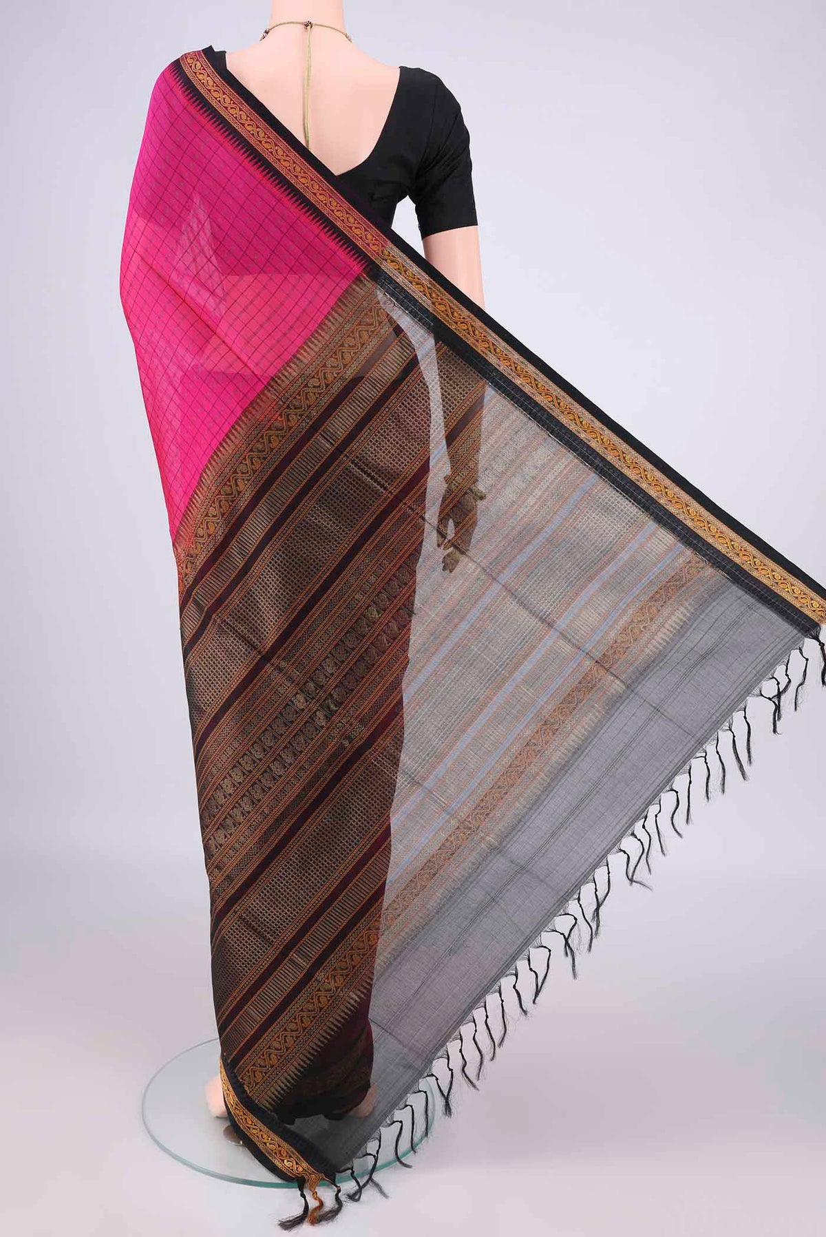 Flat view of Rani Pink Coimbatore Cotton Saree with Checked design on the body and Zari Border. 
