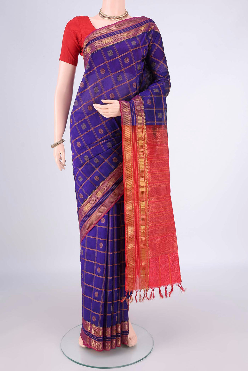 Royal Blue Coimbatore Cotton Saree with Checked design on the body and Zari Border.  displayed on a mannequin