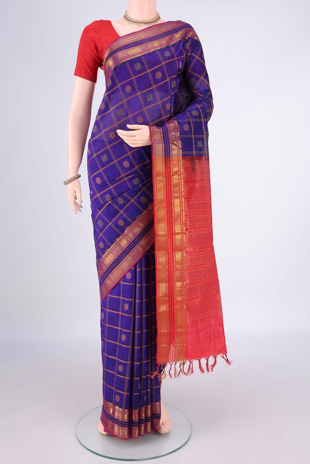 Royal Blue Coimbatore Cotton Saree with Checked design on the body and Zari Border.  displayed on a mannequin