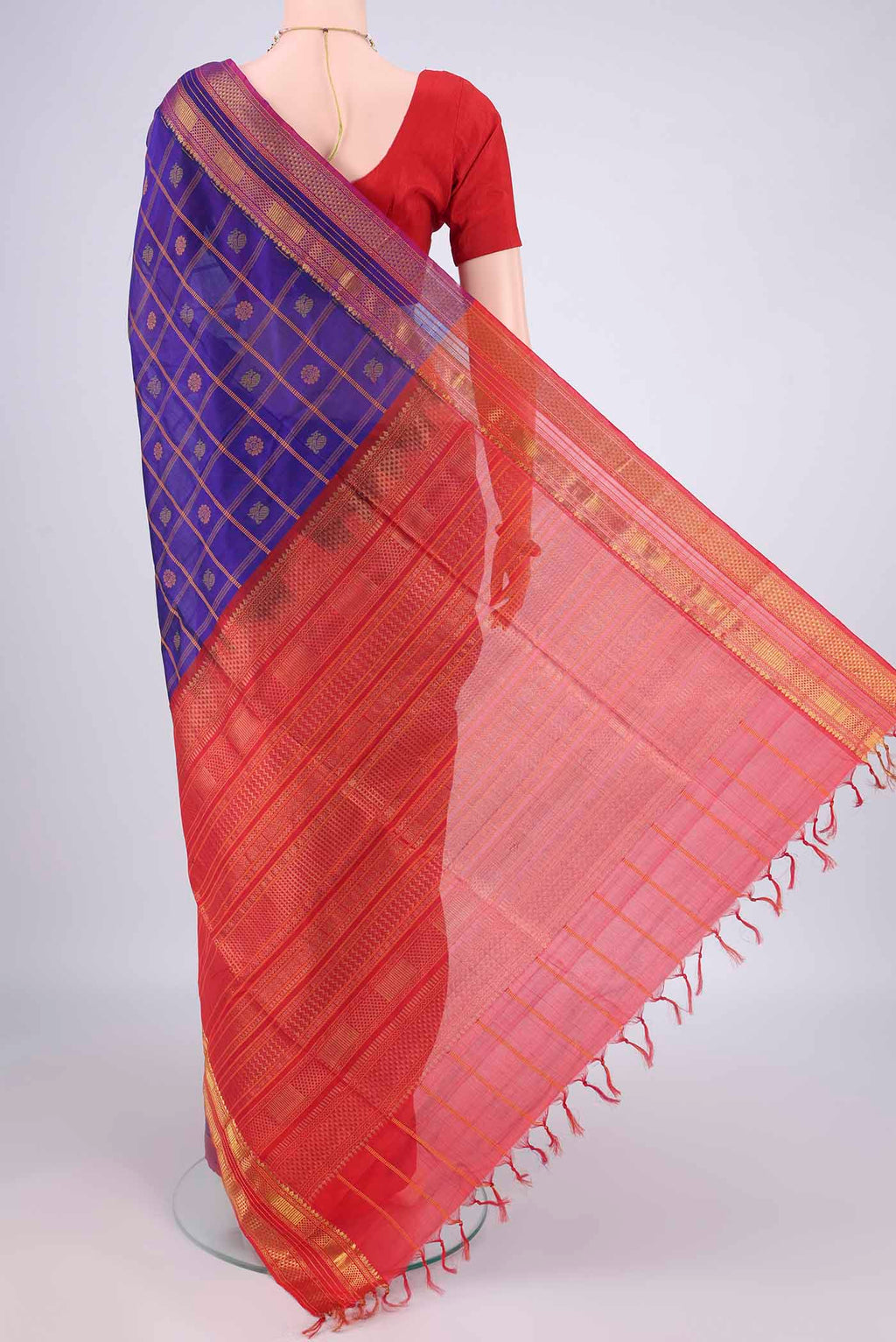 Flat view of Royal Blue Coimbatore Cotton Saree with Checked design on the body and Zari Border. 