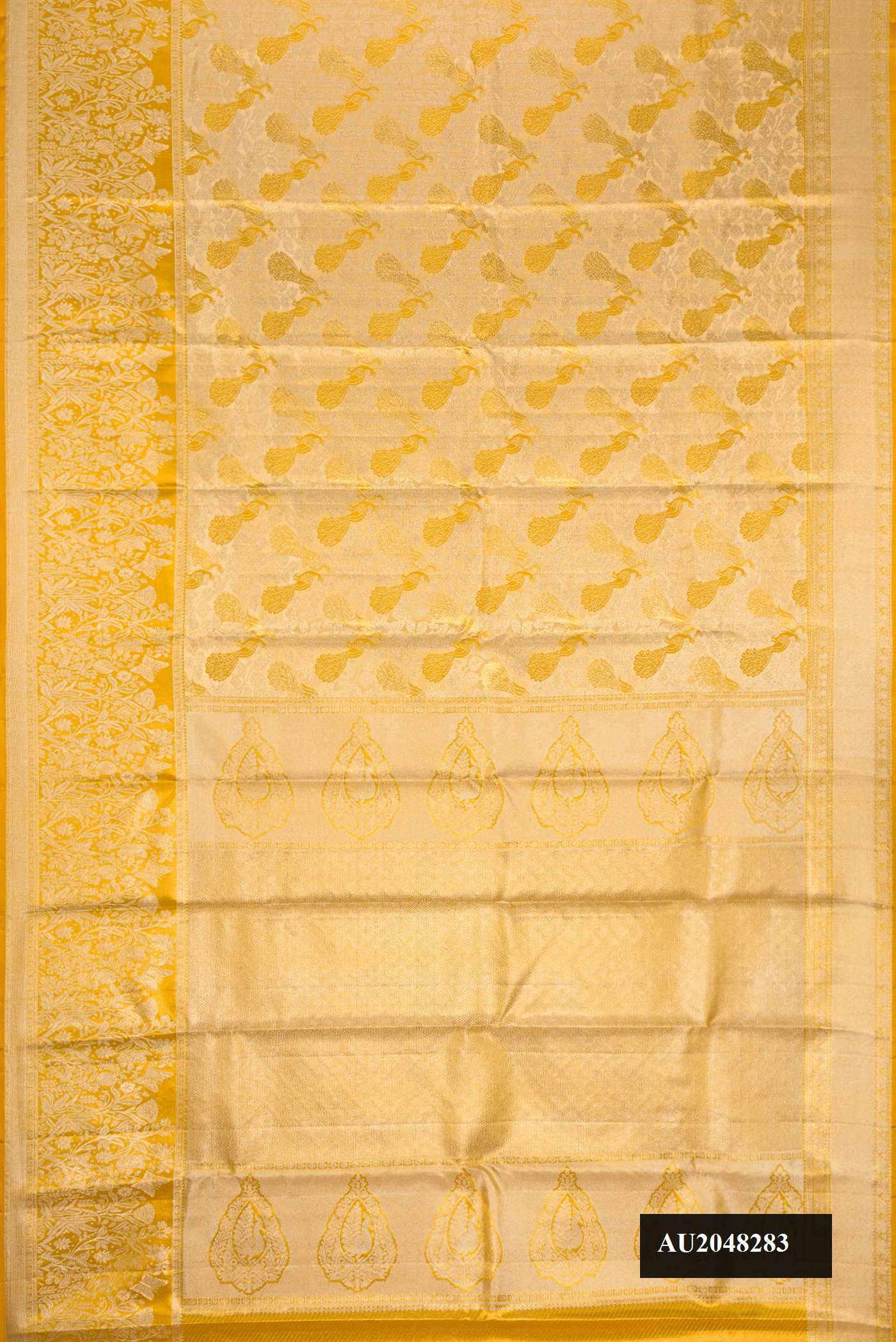 Gold Dual Tone Kanchipuram Tissue Silk Saree with Zari Brocade on the body and Zari Border.  displayed on a mannequin