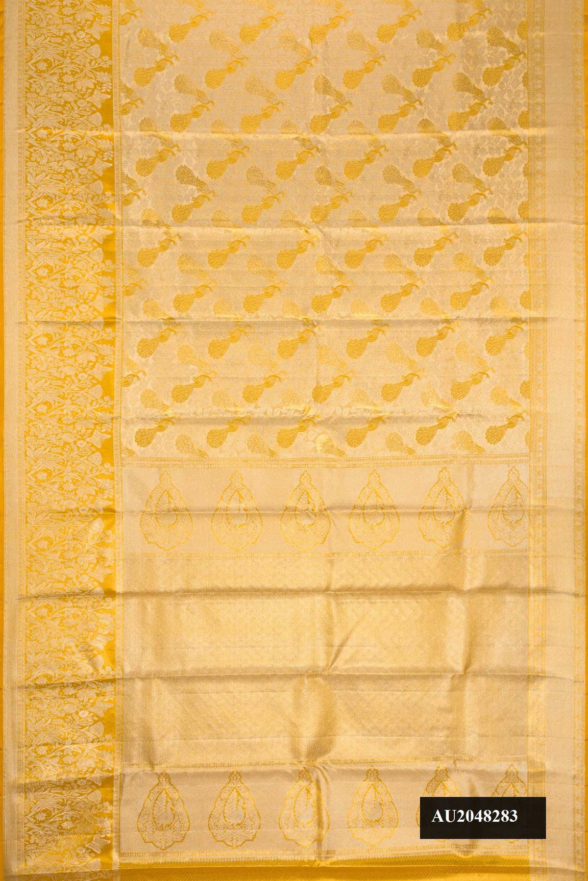Gold Dual Tone Kanchipuram Tissue Silk Saree with Zari Brocade on the body and Zari Border.  displayed on a mannequin