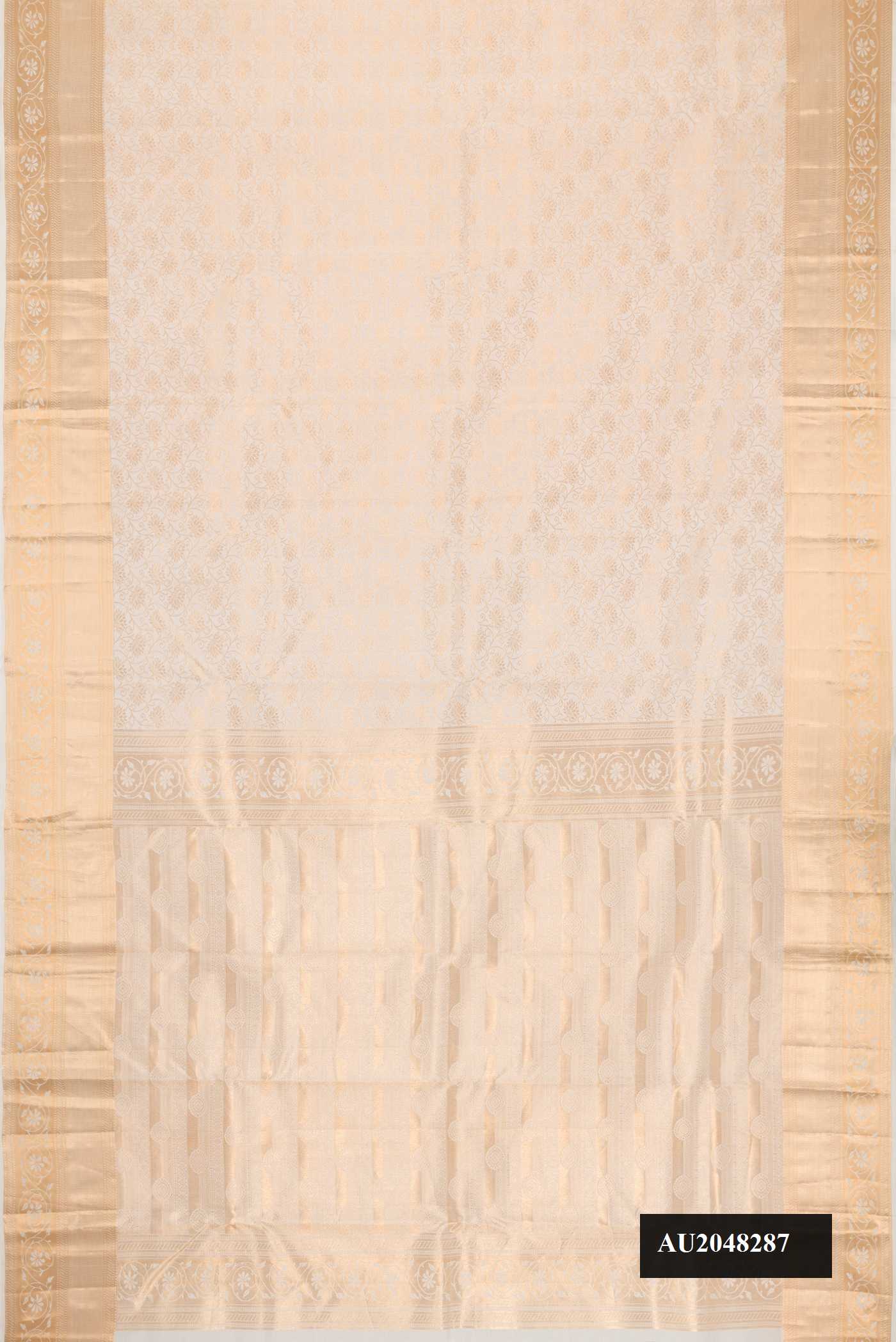 Off White Dual Tone Kanchipuram Silk Saree with Zari Brocade on the body and Zari Border.  displayed on a mannequin