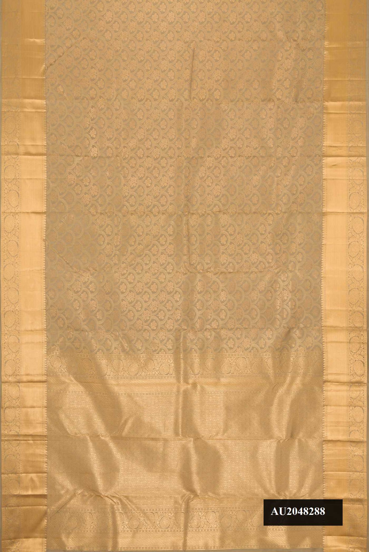 Caramel Dual Tone Kanchipuram Silk Saree with Zari Brocade on the body and Zari Border.  displayed on a mannequin