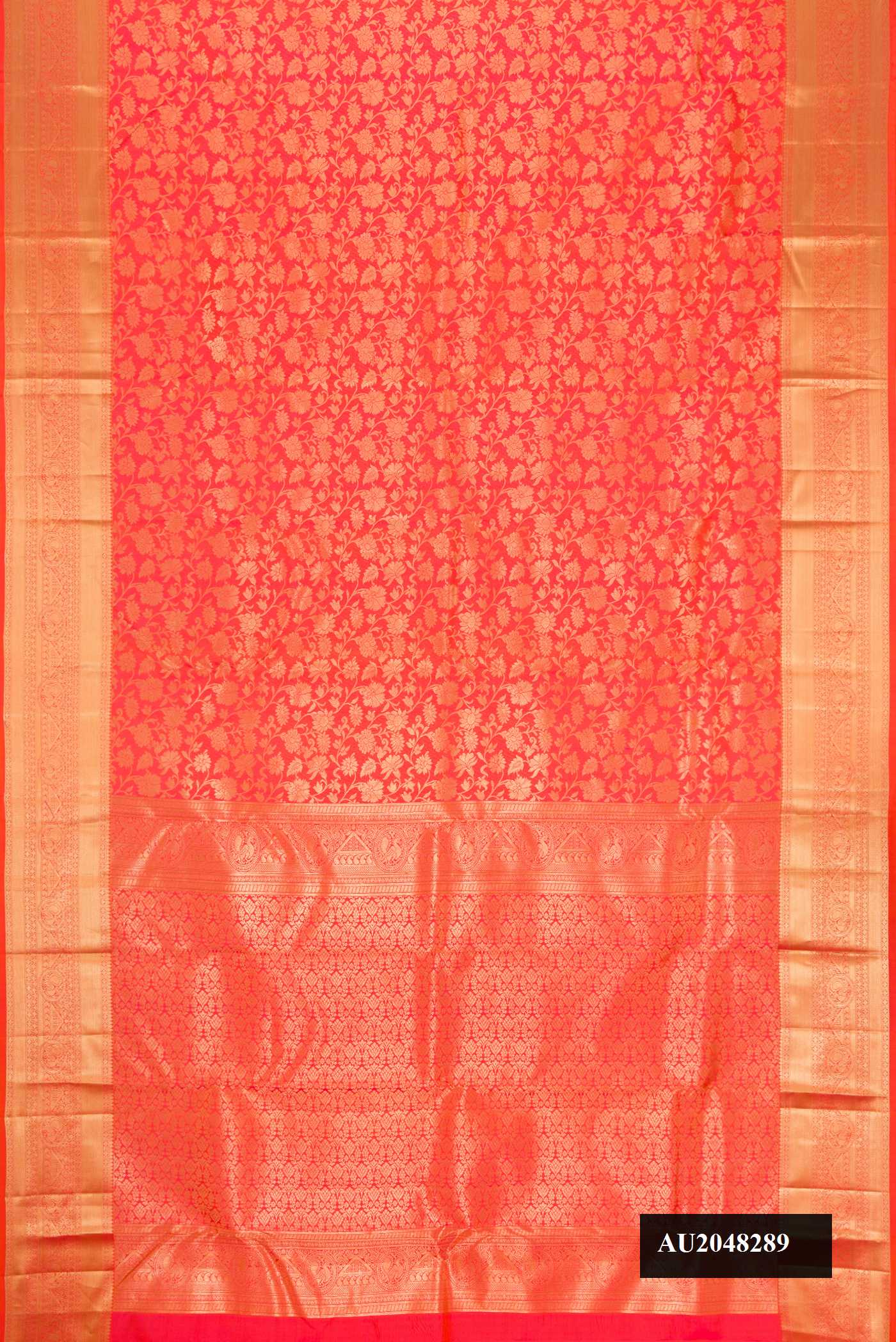 Orange Dual Tone Kanchipuram Silk Saree with Zari Brocade on the body and Zari Border.  displayed on a mannequin