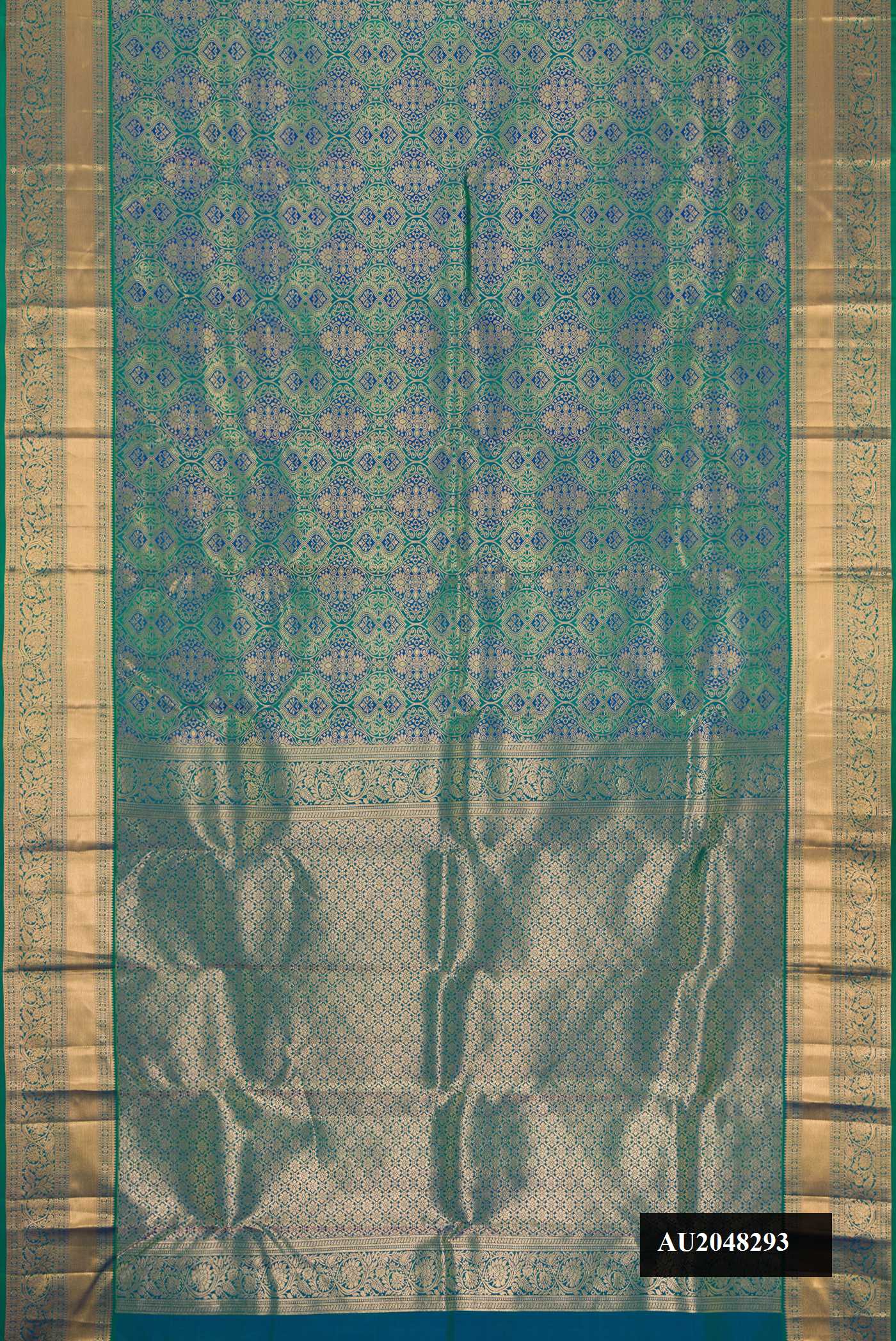 Peacock Blue Dual Tone Kanchipuram Silk Saree with Zari Brocade on the body and Zari Border.  displayed on a mannequin
