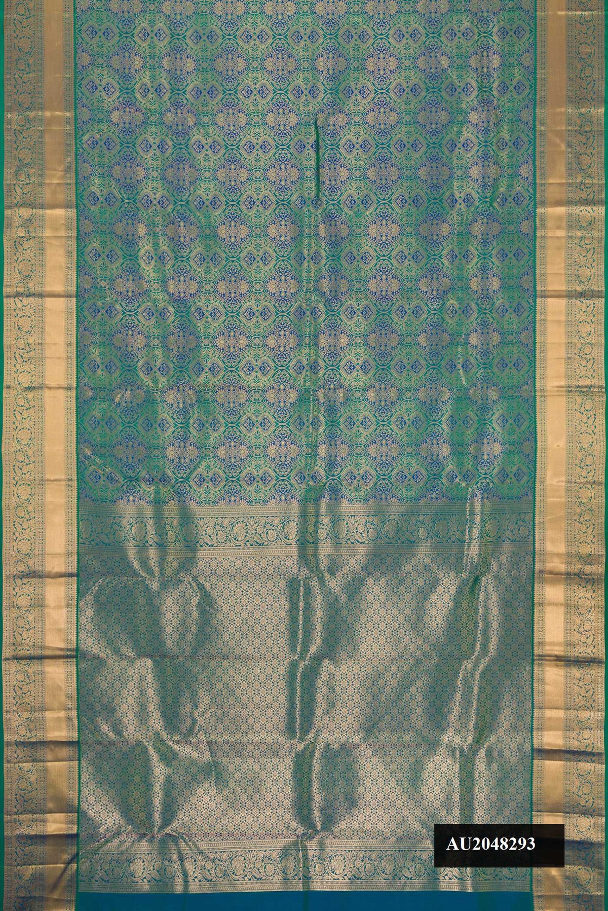 Peacock Blue Dual Tone Kanchipuram Silk Saree with Zari Brocade on the body and Zari Border.  displayed on a mannequin
