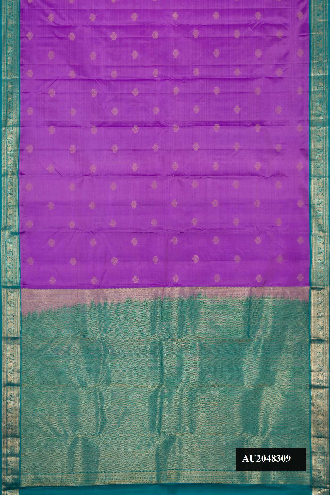 Lavender Dual Tone Kanchipuram Silk Saree with Zari Butta on the body and Zari Border.  displayed on a mannequin