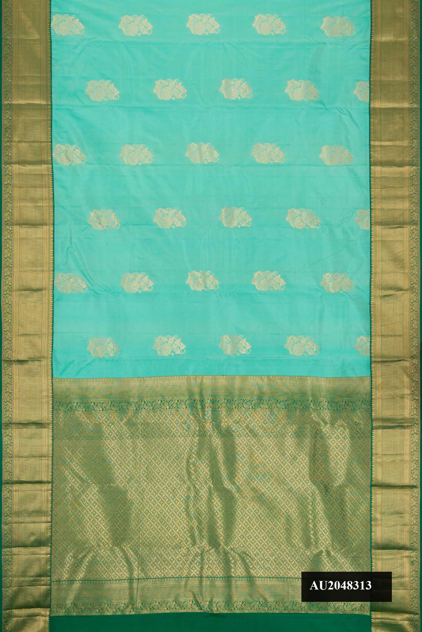 Sea Green Dual Tone Kanchipuram Silk Saree with Zari Butta on the body and Zari Border.  displayed on a mannequin