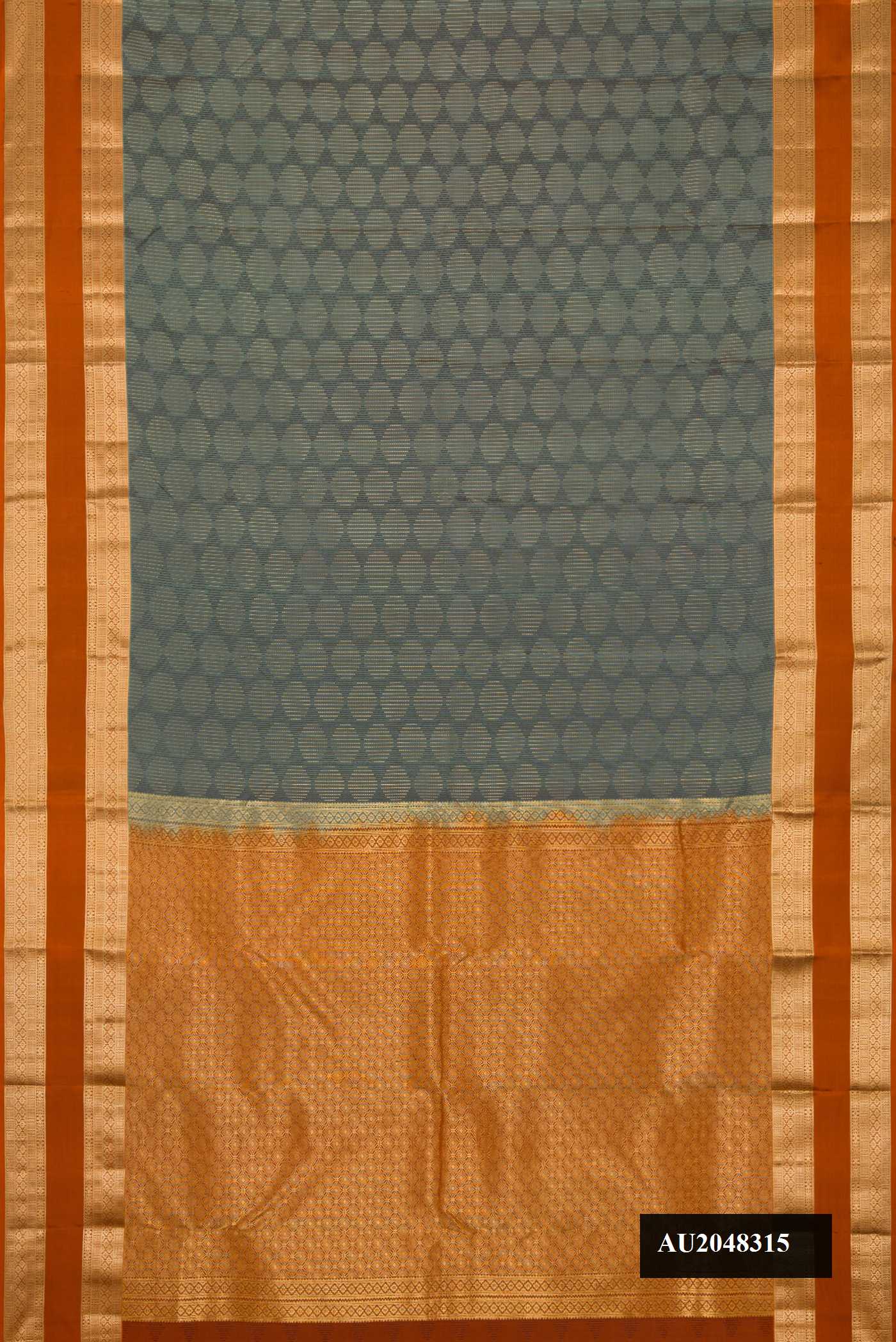 Grey Dual Tone Kanchipuram Silk Saree with Zari Butta on the body and Zari Border.  displayed on a mannequin