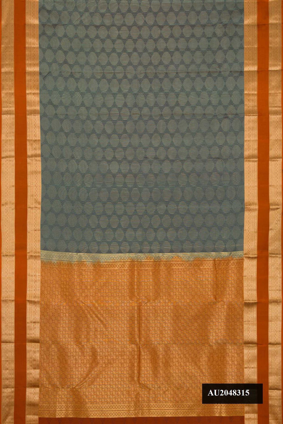 Grey Dual Tone Kanchipuram Silk Saree with Zari Butta on the body and Zari Border.  displayed on a mannequin