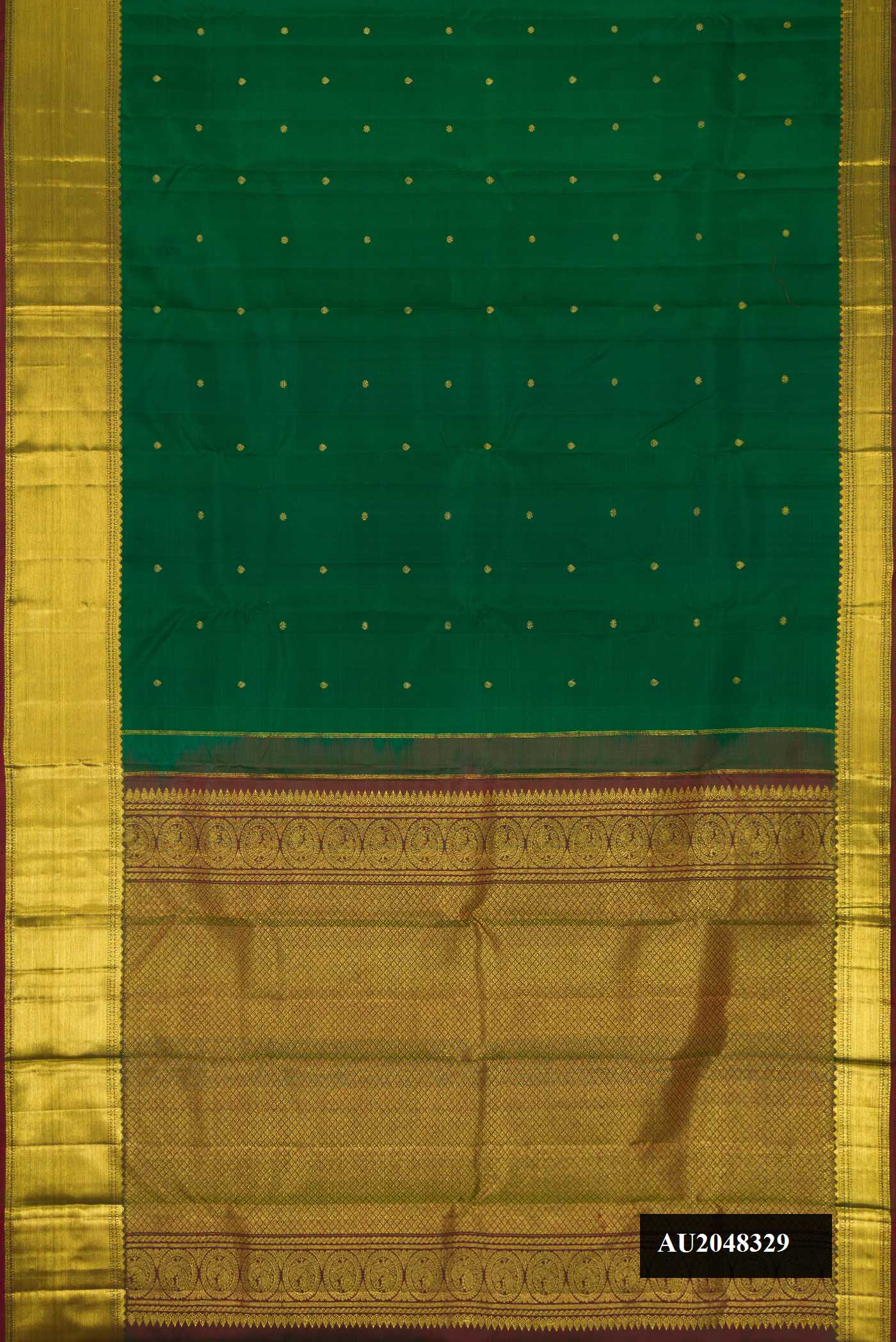 Bottle Green Dual Tone Kanchipuram Silk Saree with Zari Butta on the body and Zari Border.  displayed on a mannequin