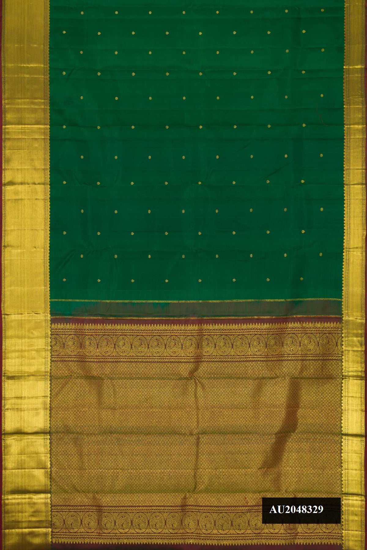 Bottle Green Dual Tone Kanchipuram Silk Saree with Zari Butta on the body and Zari Border.  displayed on a mannequin