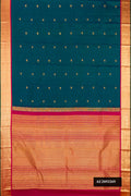 Peacock Blue Dual Tone Kanchipuram Silk Saree with Zari Butta on the body and Zari Border.  displayed on a mannequin