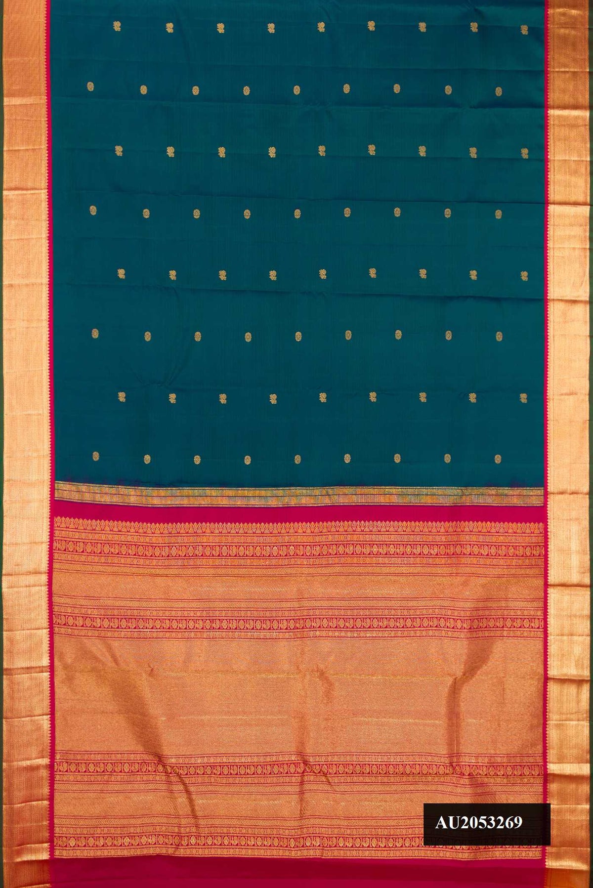 Peacock Blue Dual Tone Kanchipuram Silk Saree with Zari Butta on the body and Zari Border.  displayed on a mannequin