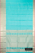 Sky Blue Dual Tone Kanchipuram Silk Saree with Zari Butta on the body and Zari Border.  displayed on a mannequin