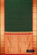 Bottle Green Dual Tone Kanchipuram Silk Saree with Zari Butta on the body and Zari Border.  displayed on a mannequin
