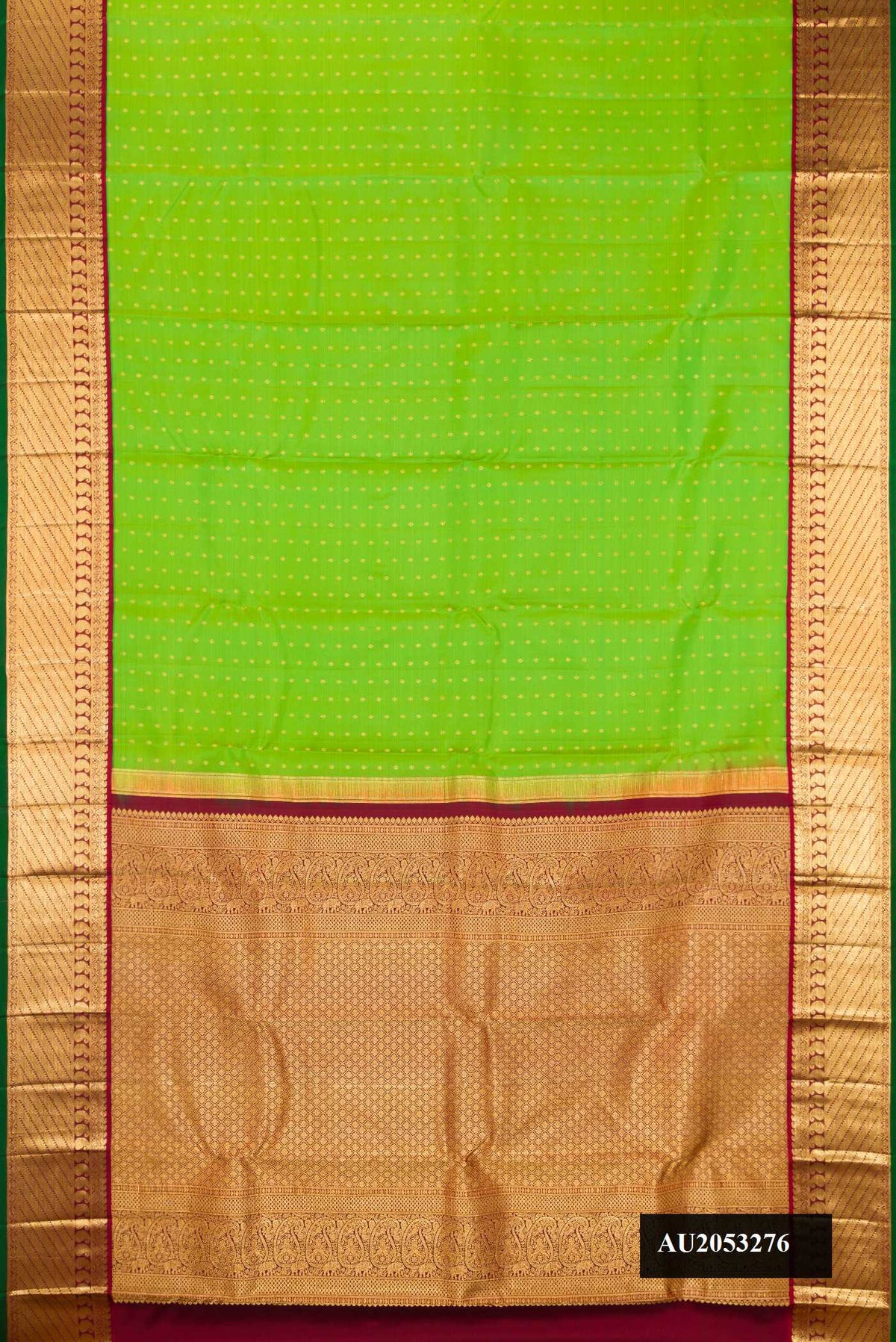 Parrot Green Dual Tone Kanchipuram Silk Saree with Zari Butta on the body and Zari Border.  displayed on a mannequin