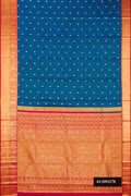 Peacock Blue Dual Tone Kanchipuram Silk Saree with Zari Butta on the body and Zari Border.  displayed on a mannequin