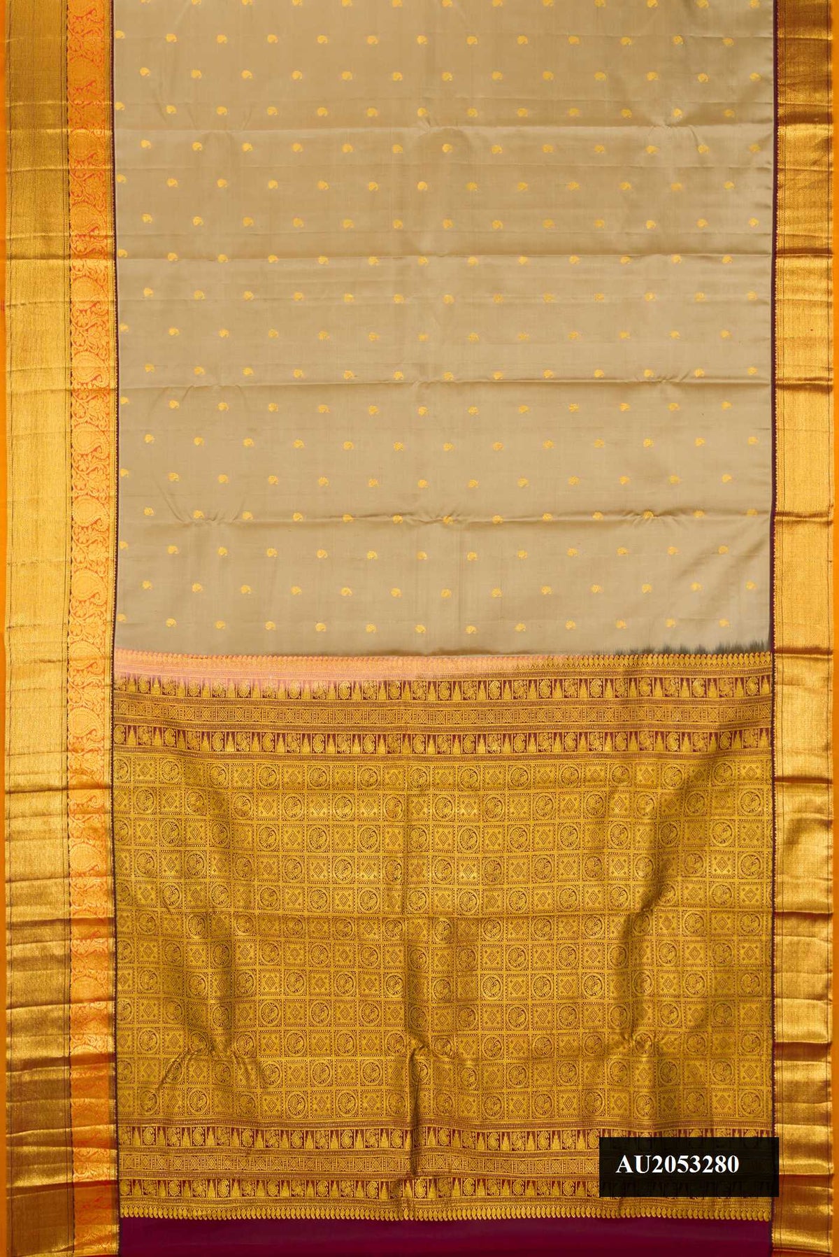 Dark Beige Dual Tone Kanchipuram Silk Saree with Zari Butta on the body and Zari Border.  displayed on a mannequin