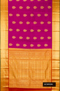 Dark Pink Dual Tone Kanchipuram Silk Saree with Zari Butta on the body and Zari Border.  displayed on a mannequin