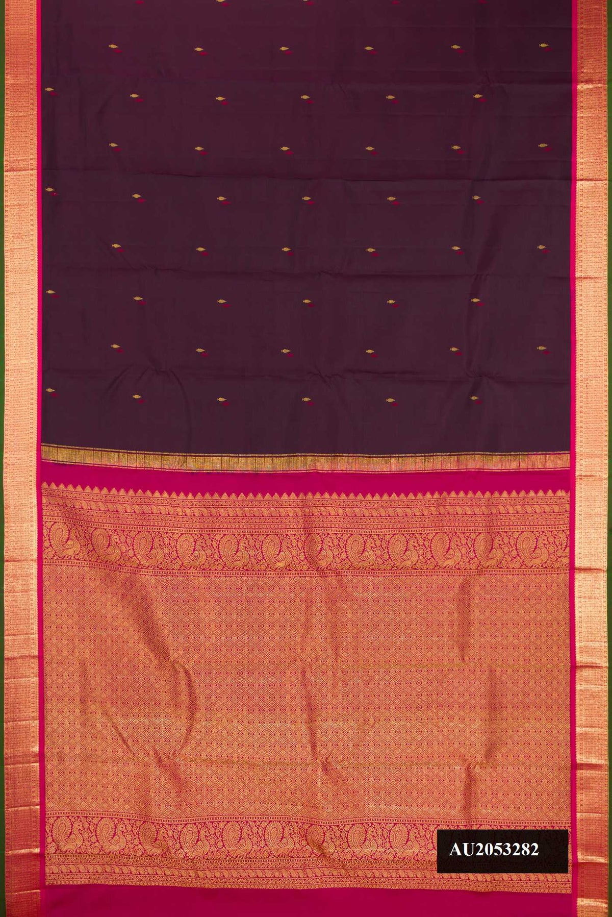 Burgundy Dual Tone Kanchipuram Silk Saree with Zari Butta on the body and Zari Border.  displayed on a mannequin