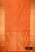 Coral Dual Tone Kanchipuram Silk Saree with Zari Brocade on the body and Zari Border.  displayed on a mannequin