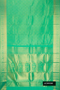 Light Green Dual Tone Kanchipuram Silk Saree with Zari Brocade on the body and Zari Border.  displayed on a mannequin
