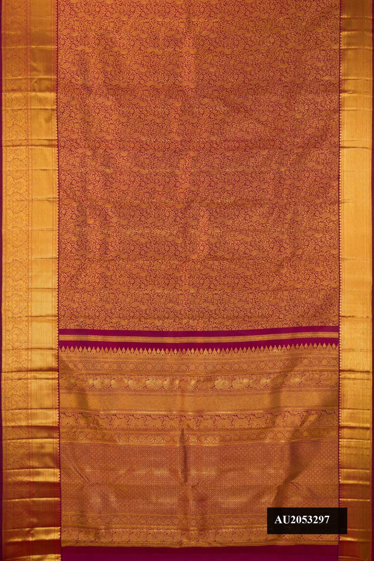 Maroon Dual Tone Kanchipuram Silk Saree with Zari Brocade on the body and Zari Border.  displayed on a mannequin