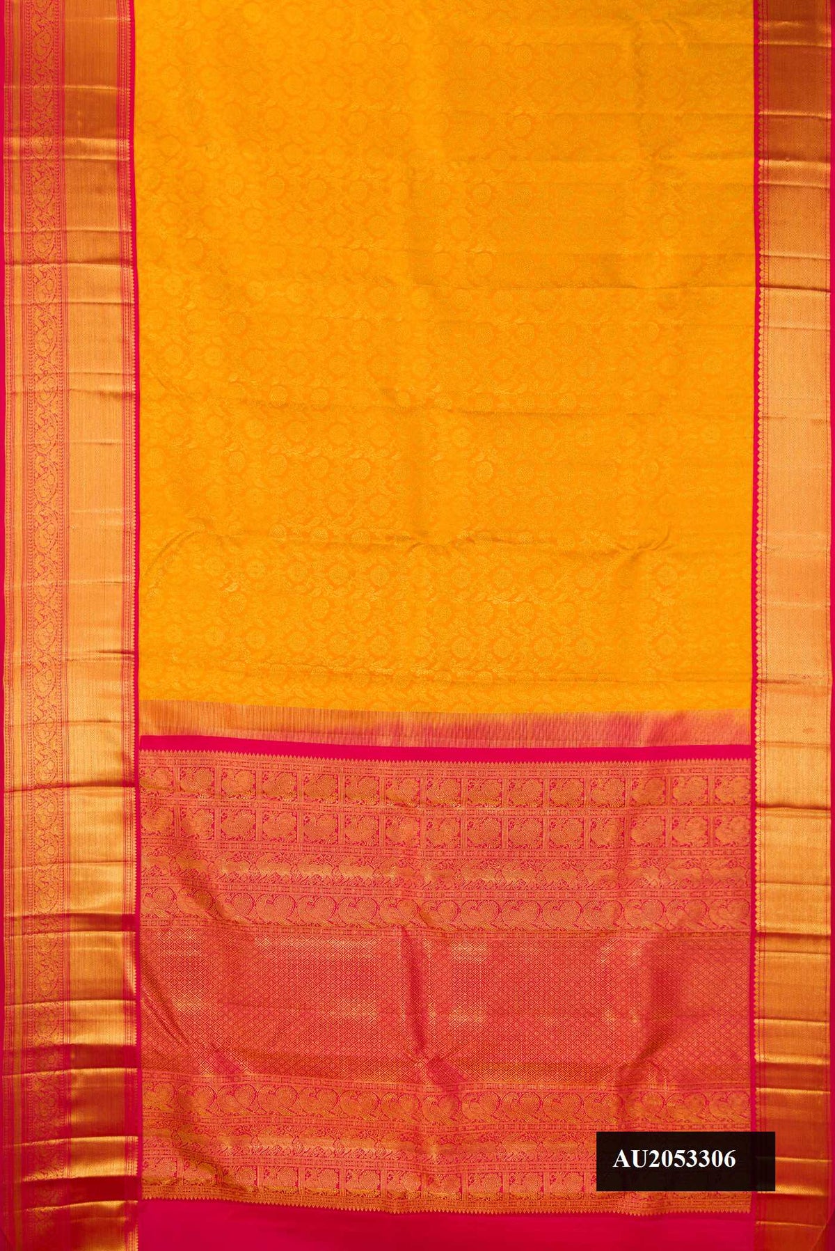 Mustard Dual Tone Kanchipuram Silk Saree with Zari Brocade on the body and Zari Border.  displayed on a mannequin