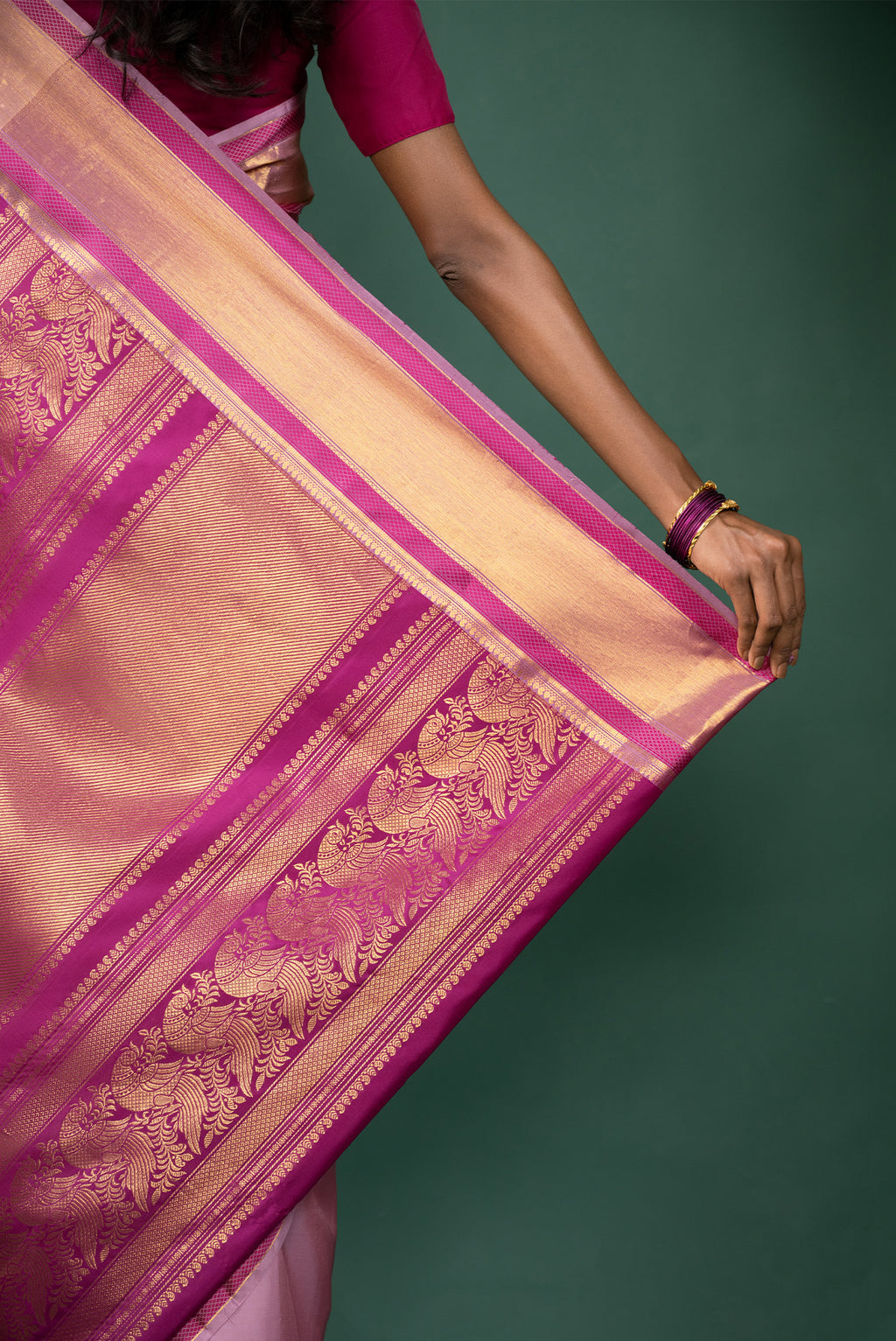 Border image of Pink Kanchipuram Silk Saree with Zari Butta on the body and Zari And Thread Border