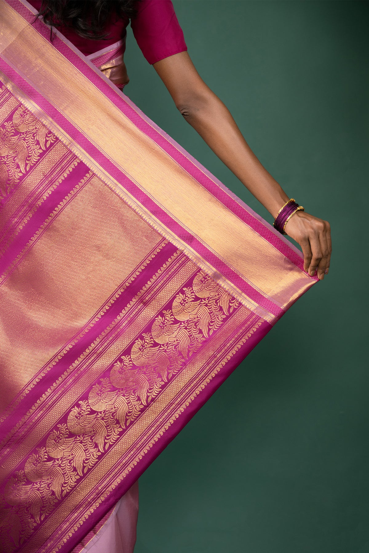 Border image of Pink Kanchipuram Silk Saree with Zari Butta on the body and Zari And Thread Border
