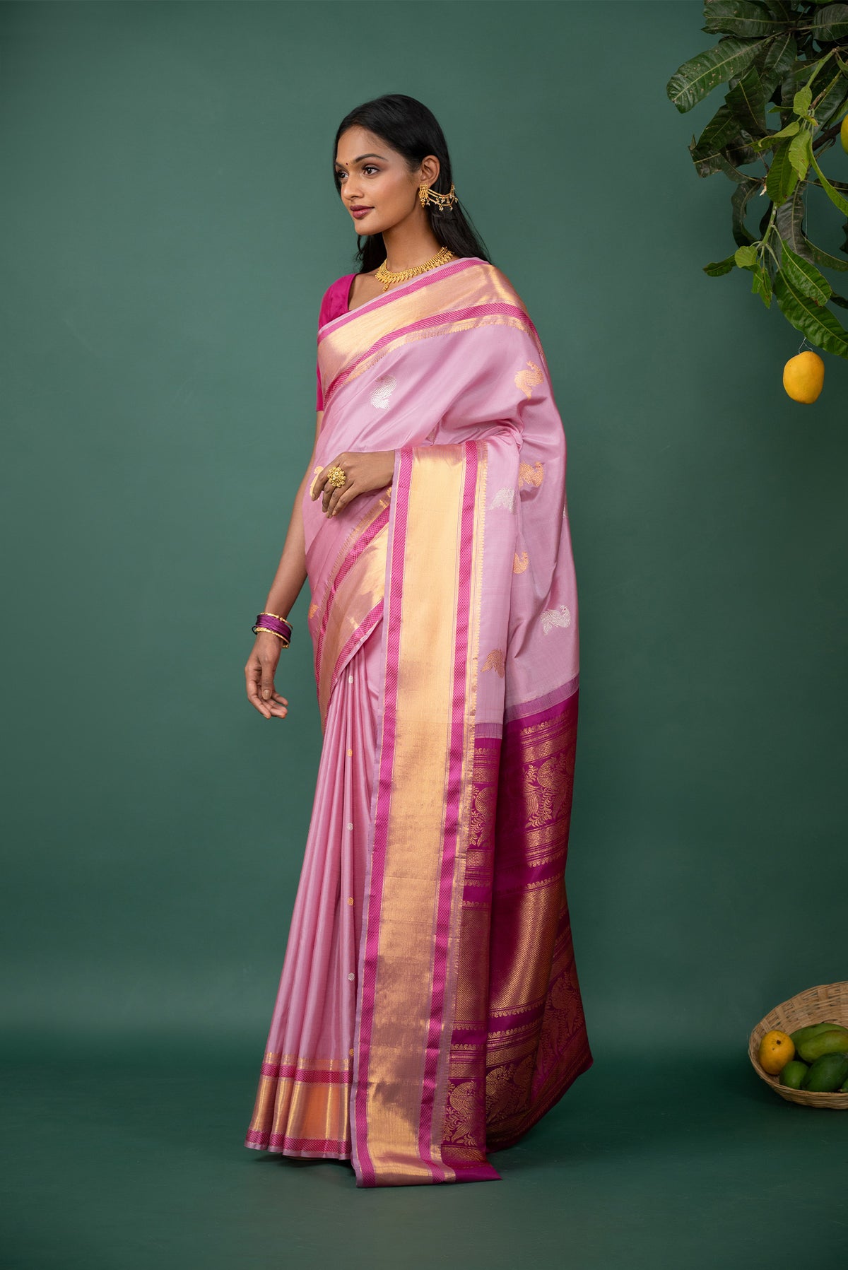 Flat view of Pink Kanchipuram Silk Saree with Zari Butta on the body and Zari And Thread Border