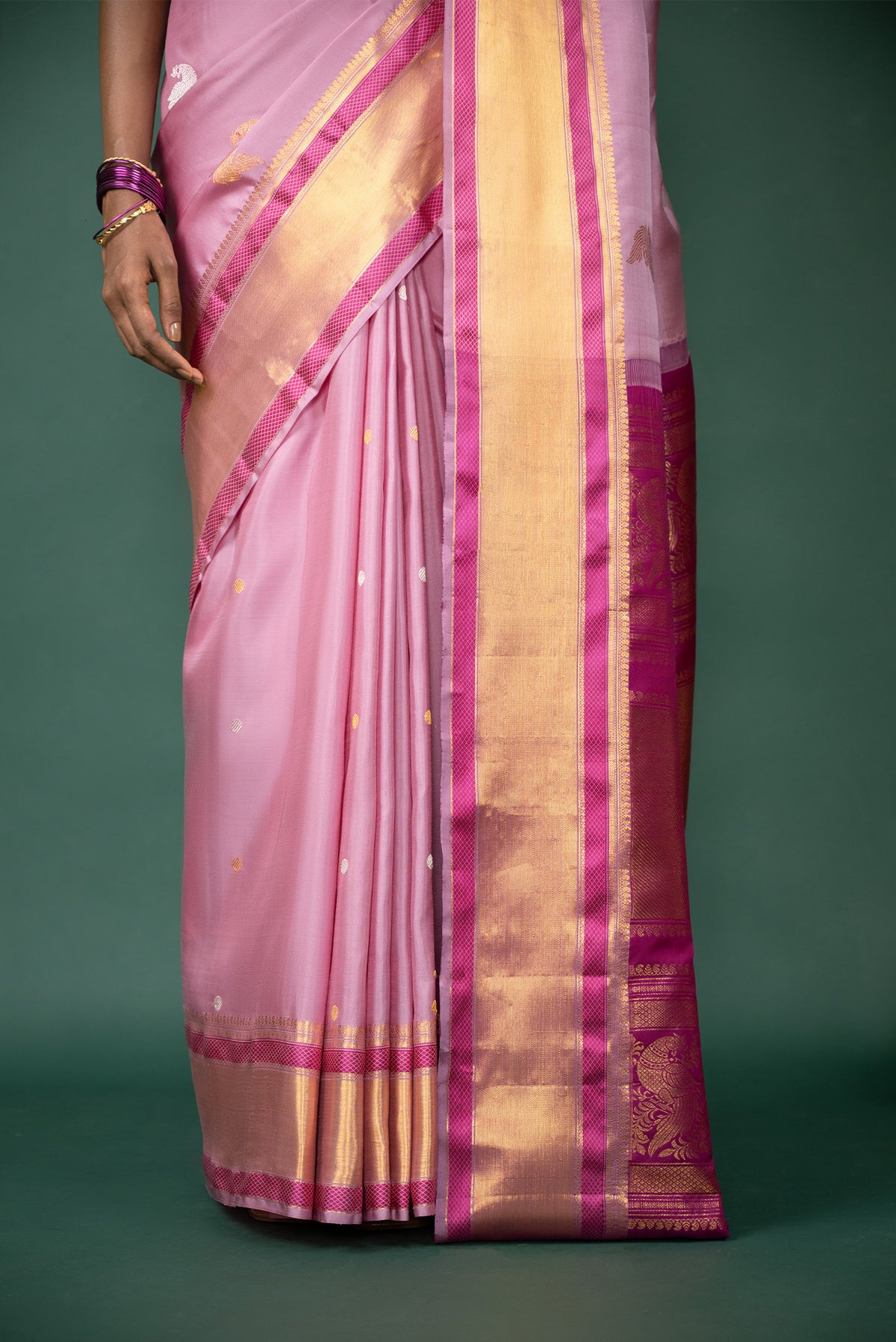 Pleats and pallu of Pink Kanchipuram Silk Saree with Zari Butta on the body and Zari And Thread Border