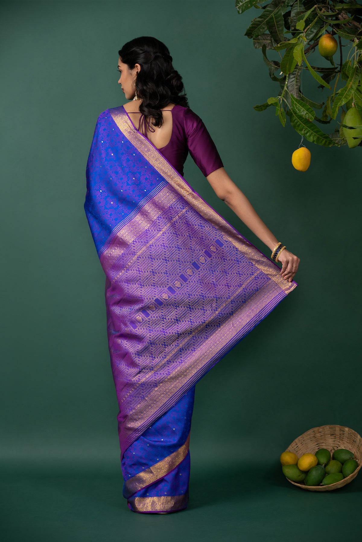 Close up image of the pallu of Blue Kanchipuram Silk Saree with Jacquard With Zari Butta on the body and Zari Border