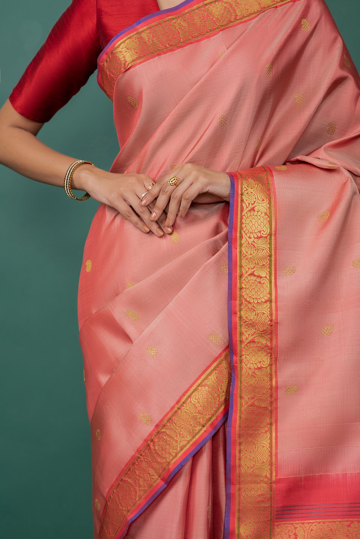 Close up image of the blouse of Mauve Kanchipuram Silk Saree with Zari Butta on the body and Zari Border
