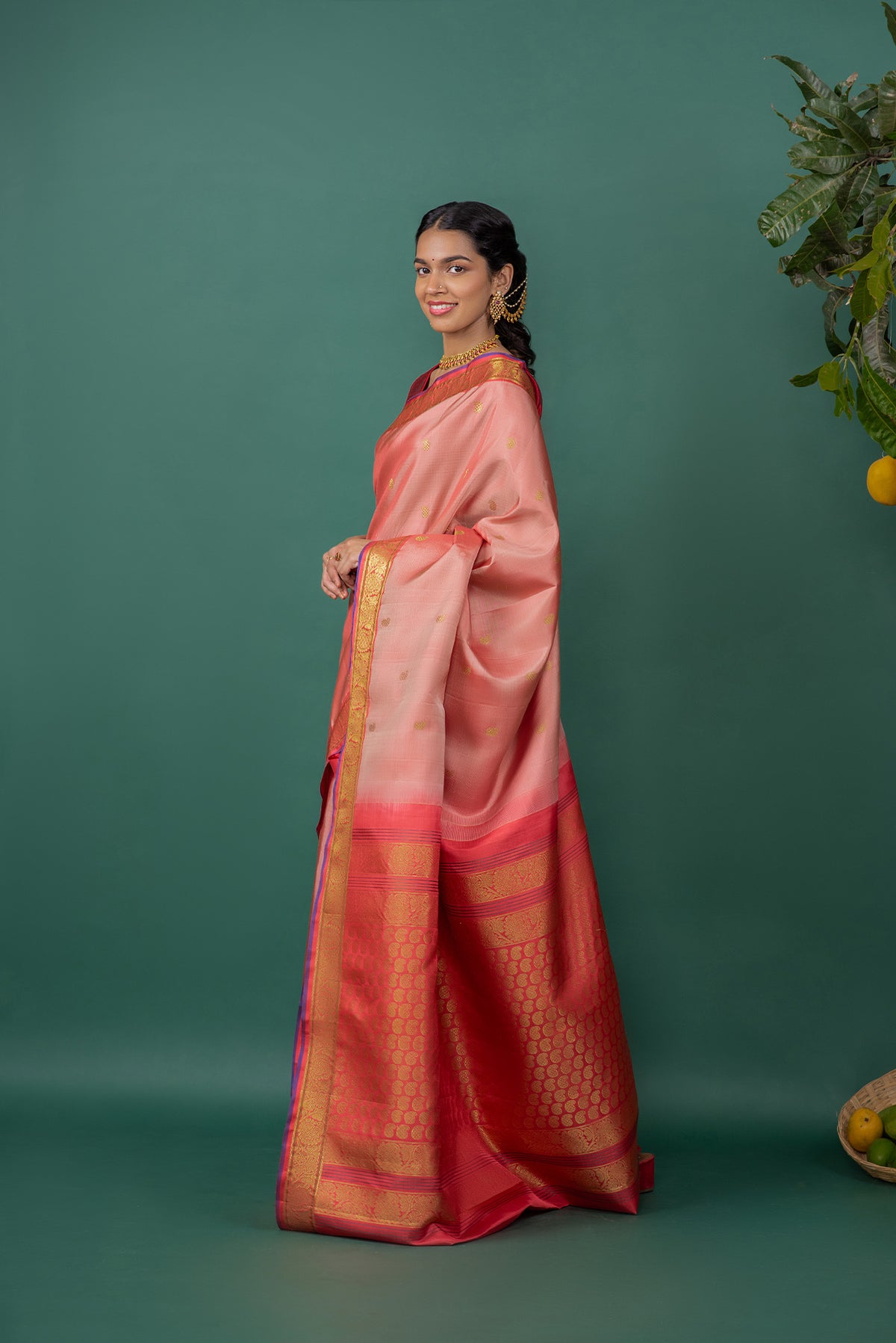Flat view of Mauve Kanchipuram Silk Saree with Zari Butta on the body and Zari Border